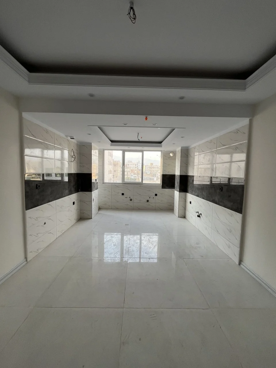 Kitchen before cabinetry installation in Piroozi Residence