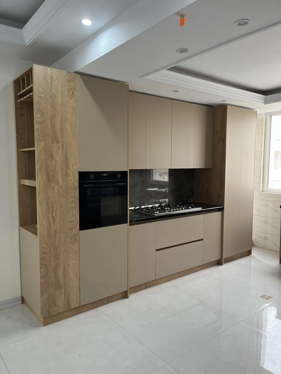 Actual installed cabinets with integrated oven and cooktop