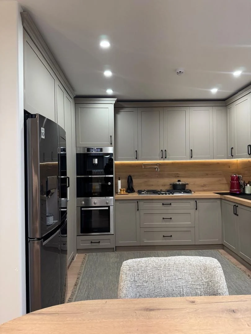 Completed neoclassical shaker cabinet fronts with oven tower